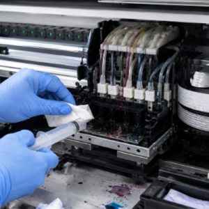 How to clean a clogged nozzle in an UV printer