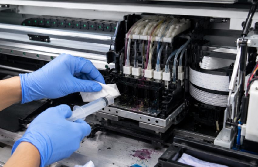 How to clean a clogged nozzle in an UV printer